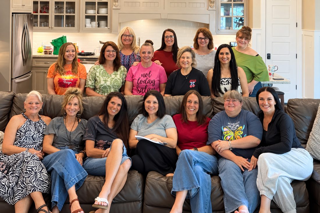 Women gathered in a living room for a Royally Redeemed retreat