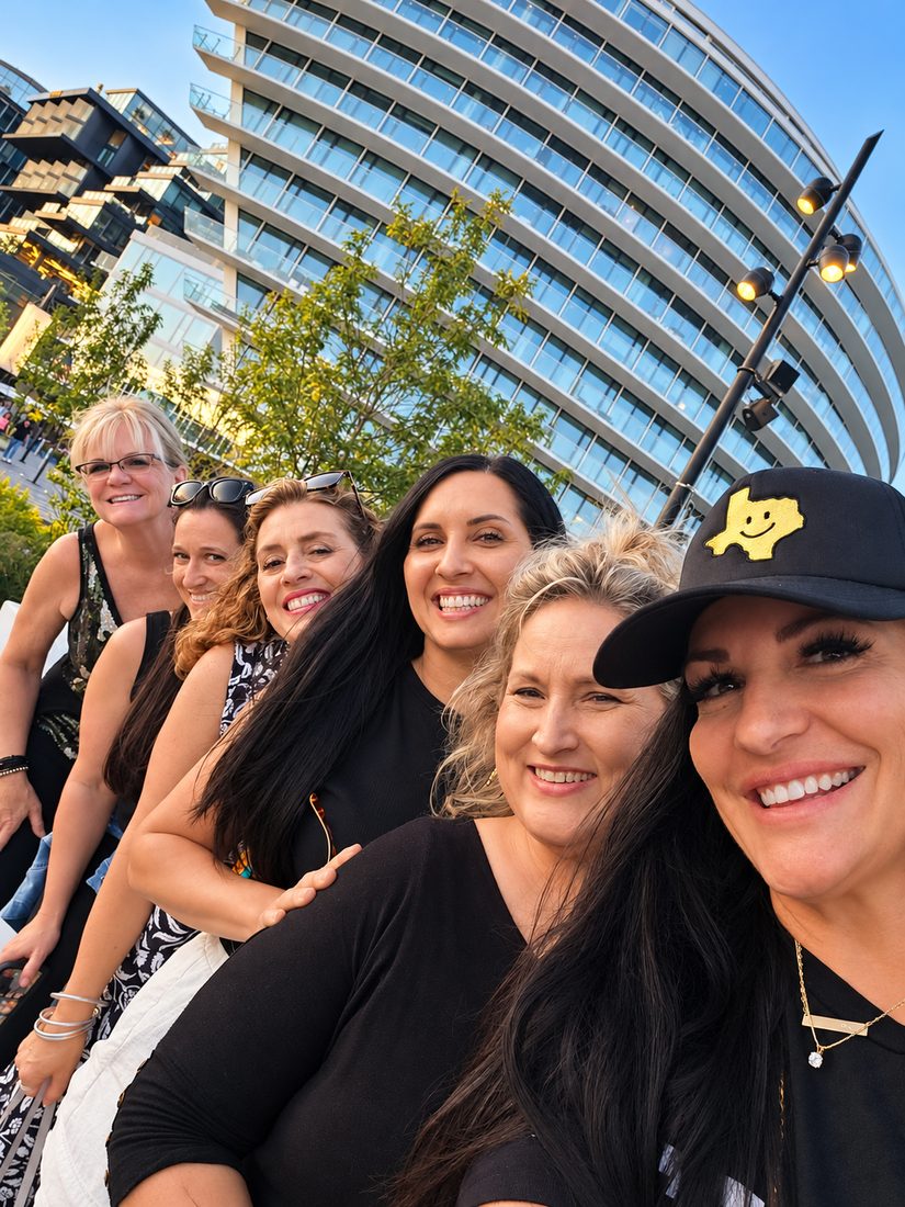 Team members smiling together in a selfie on a ministry trip